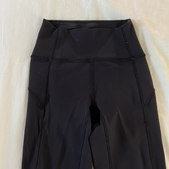 Black lululemon leggings with seems on the sides - Picture 3 of 4